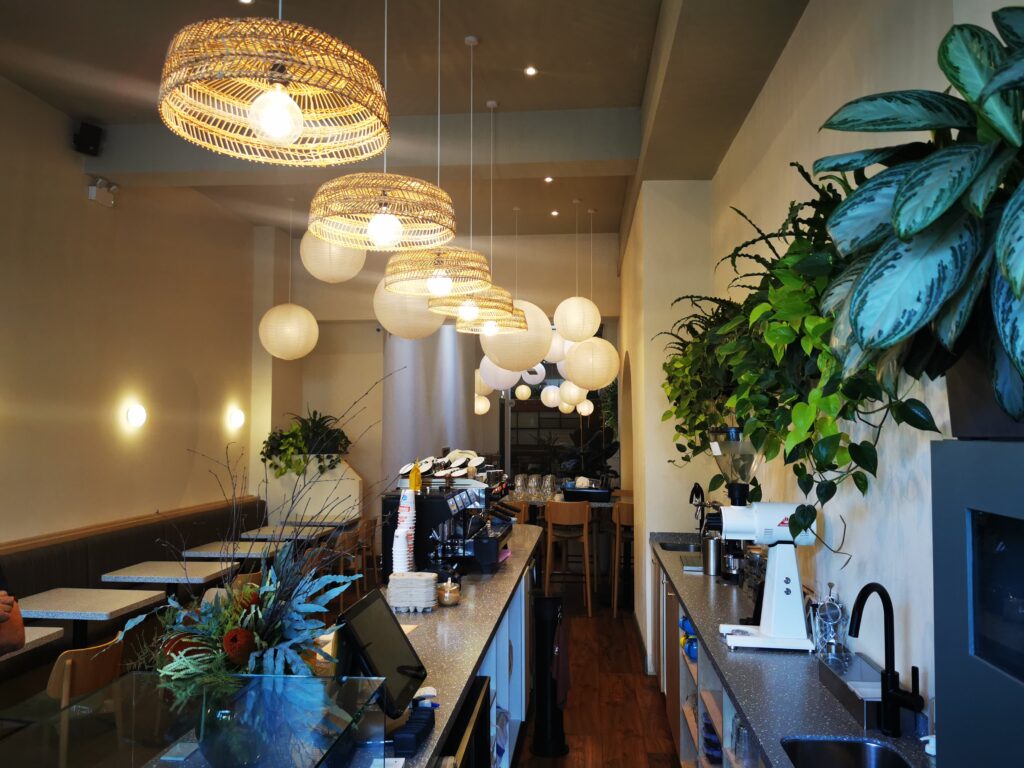 Service counter and barista station at Brother Hubbard, Ranelagh, with the kitchen beyond