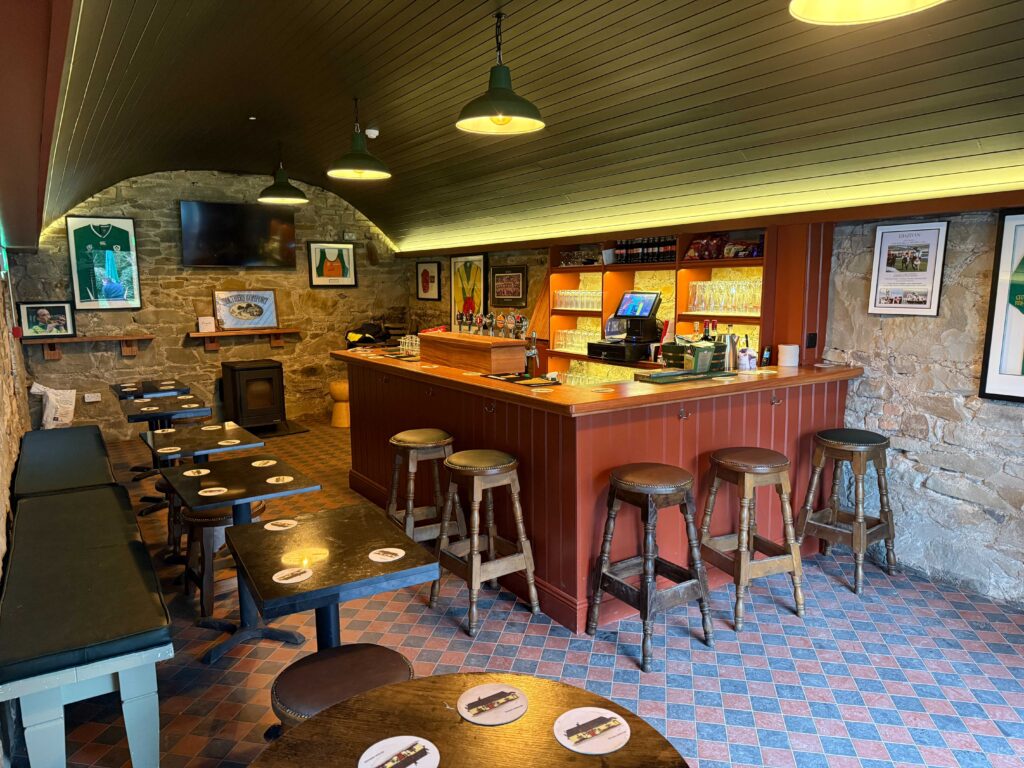 Finished bar counter and stools inside Fagan’s temporary bar, Moynalvey, Co. Meath